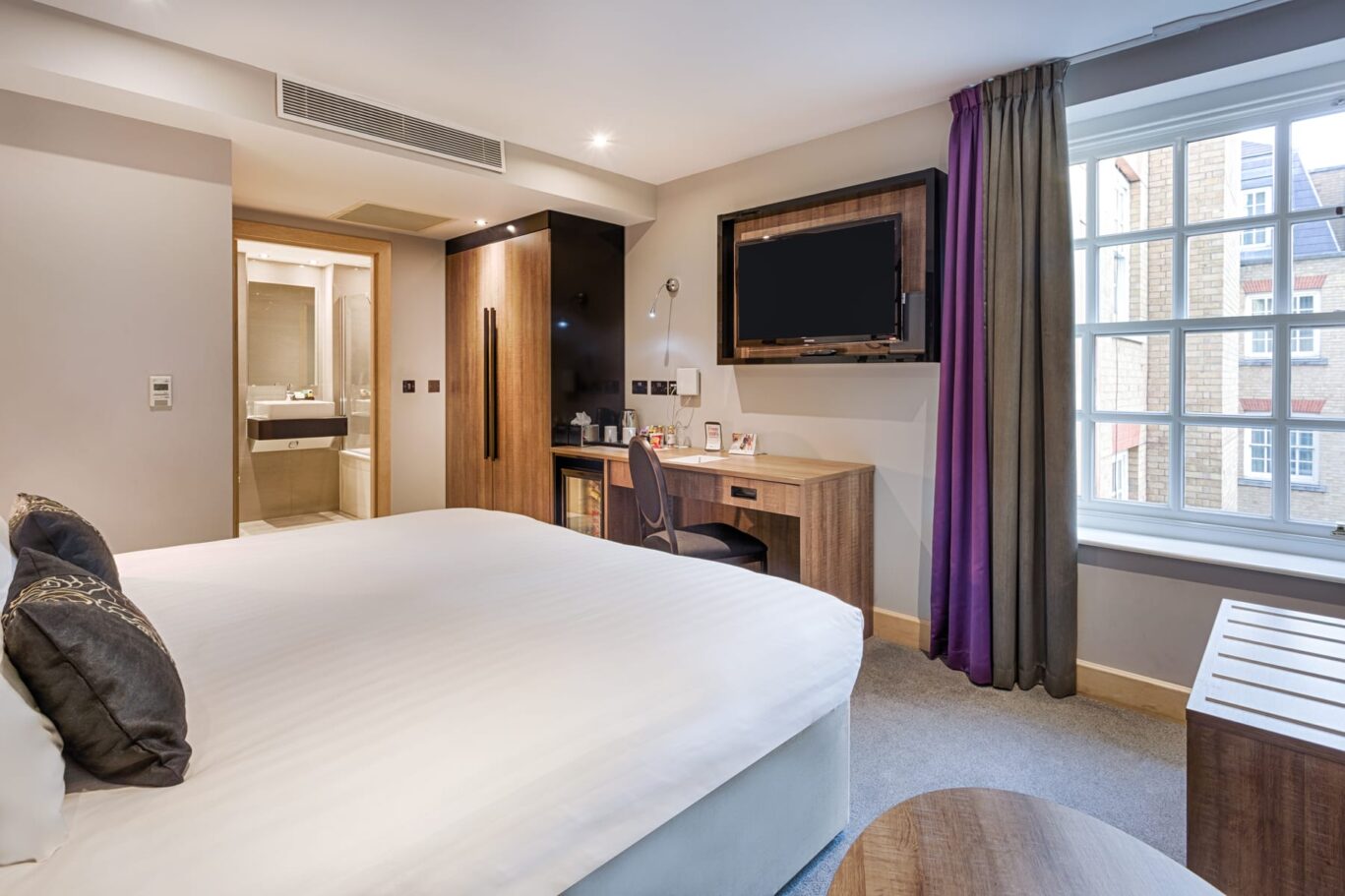 Double bedroom view with large bed.